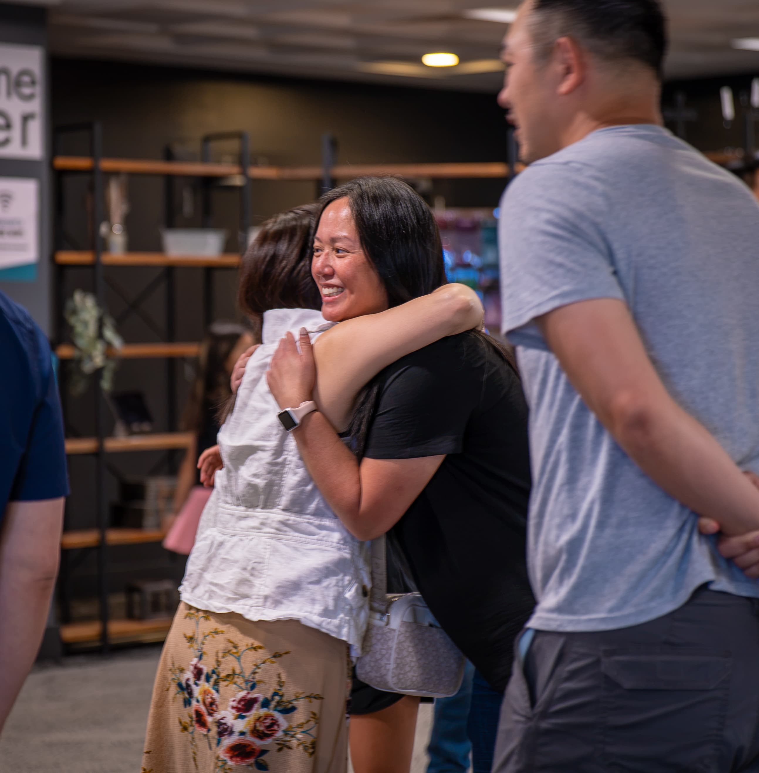 Beacon Church members embracing warmly