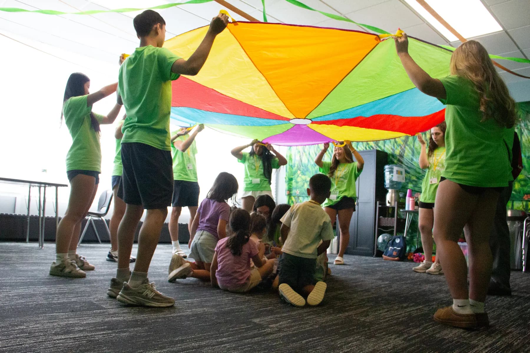 Beacon Kids leaders creating a welcoming activity for children